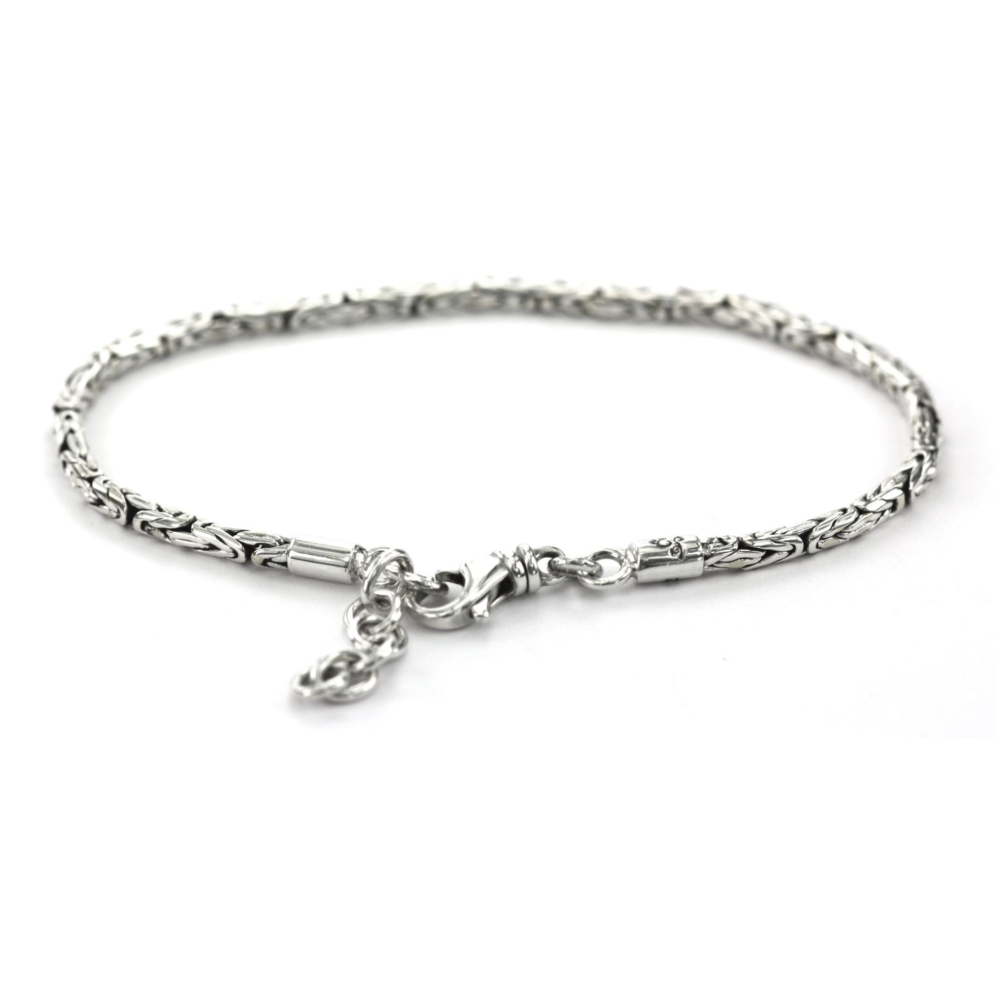 Silver byzantine chain bracelet with a lobster clasp.