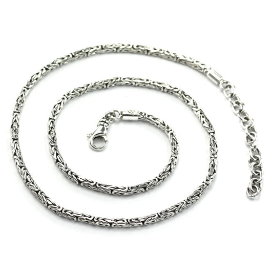 Silver byzantine chain necklace with a swivel lobster clasp and a ring link extender chain.
