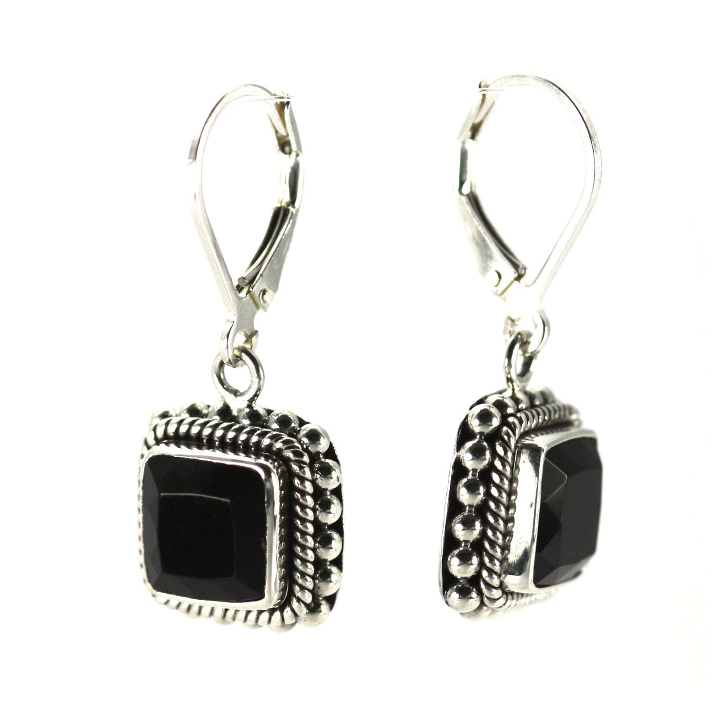 Silver earrings with square onyx gemstones and rope and bead settings.