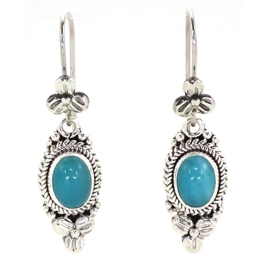 Silver floral earrings with oval amazonite gemstones.