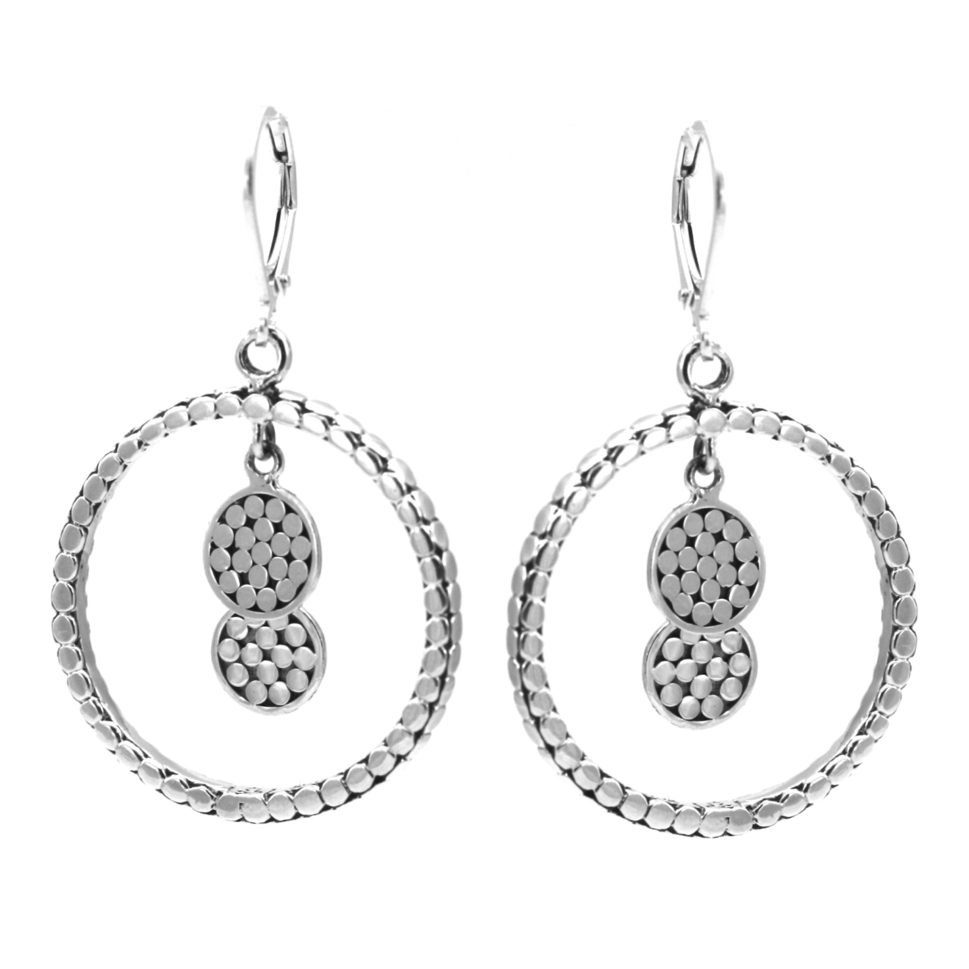 Sterling silver ring and disc drop earrings.