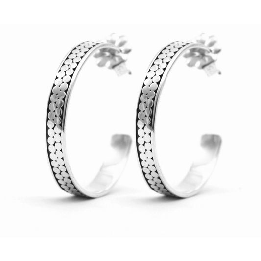 Sterling silver hoop earrings. 