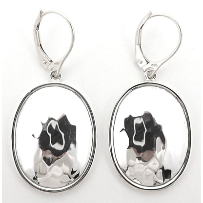Silver hammered oval earrings.