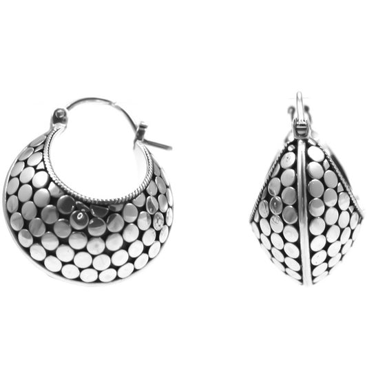 Sterling silver huggie dot motif earrings.