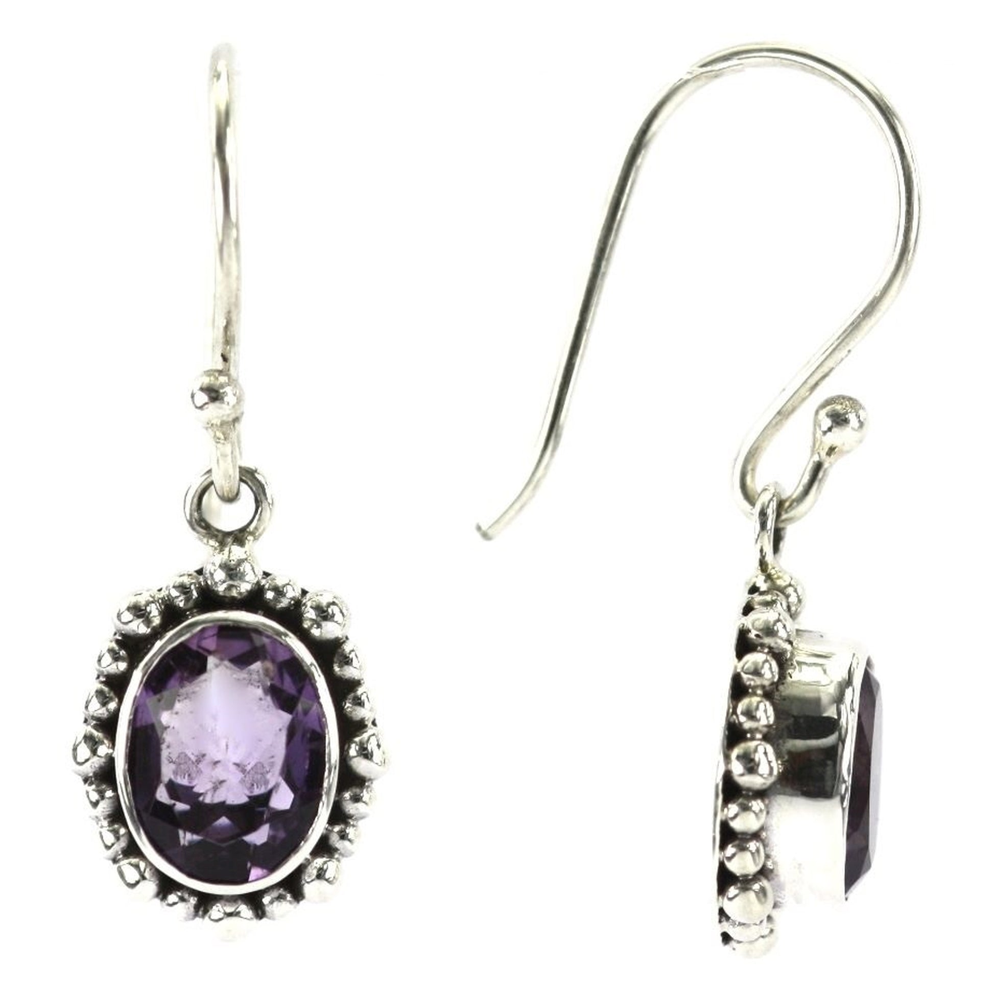 Silver earrings with oval purple amethyst gemstones.