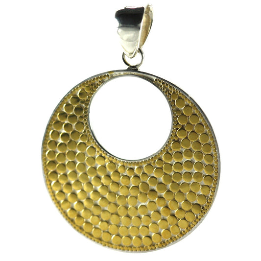 Sterling silver and gold dotted disc pendant.