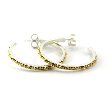 Sterling silver and gold beaded hoops. 