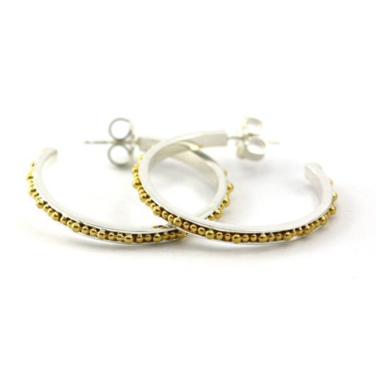 Sterling silver and gold beaded hoops. 