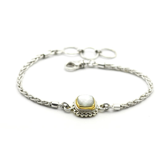 Sterling silver and gold bracelet with a mother of pearl doublet.