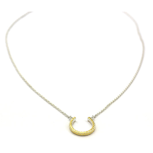 Sterling silver and gold horseshoe necklace.