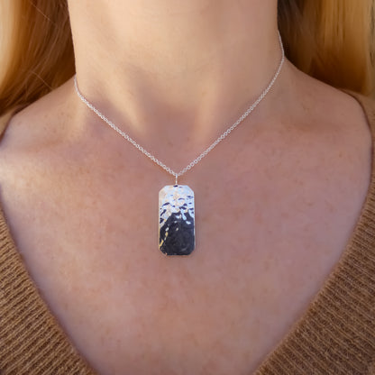 Sterling silver rectangular hammered necklace.