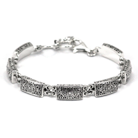 Silver bracelet made of rectangular cast links, with double ring linkage.