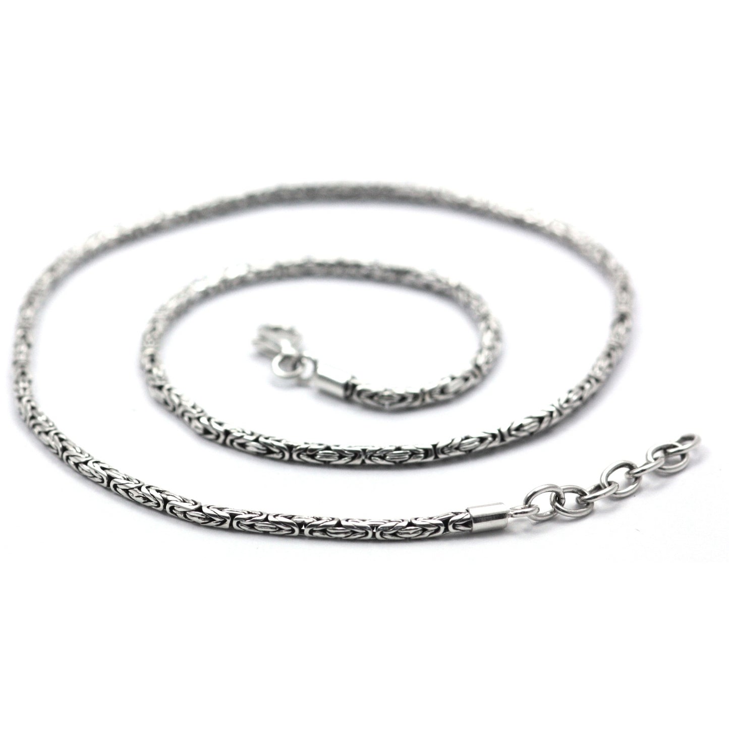 Silver byzantine chain necklace with a swivel lobster clasp and a ring link extender chain.