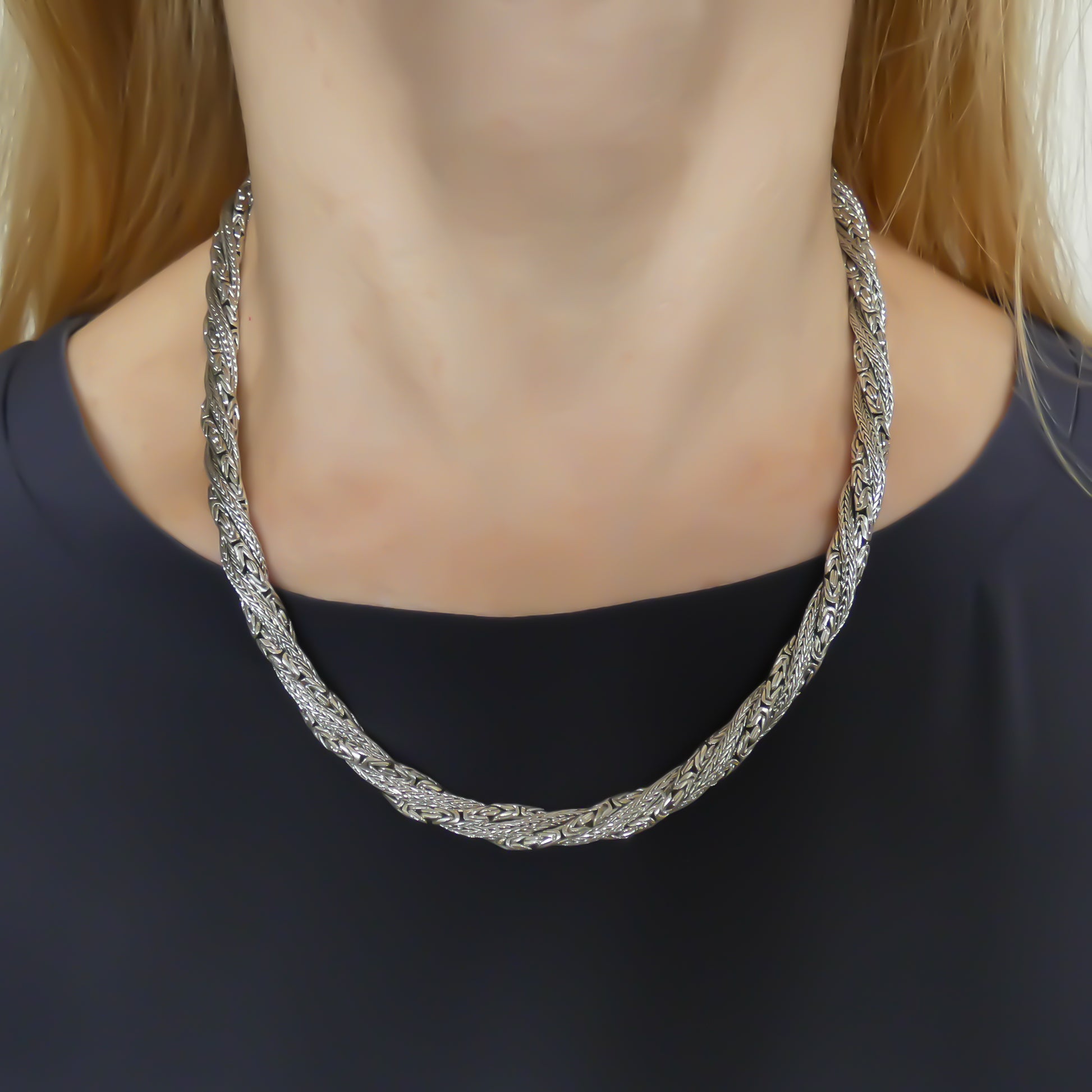 Three chain Sterling silver necklace. Twisted motif. 