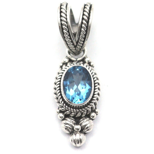 Sterling silver and blue topaz pendant.