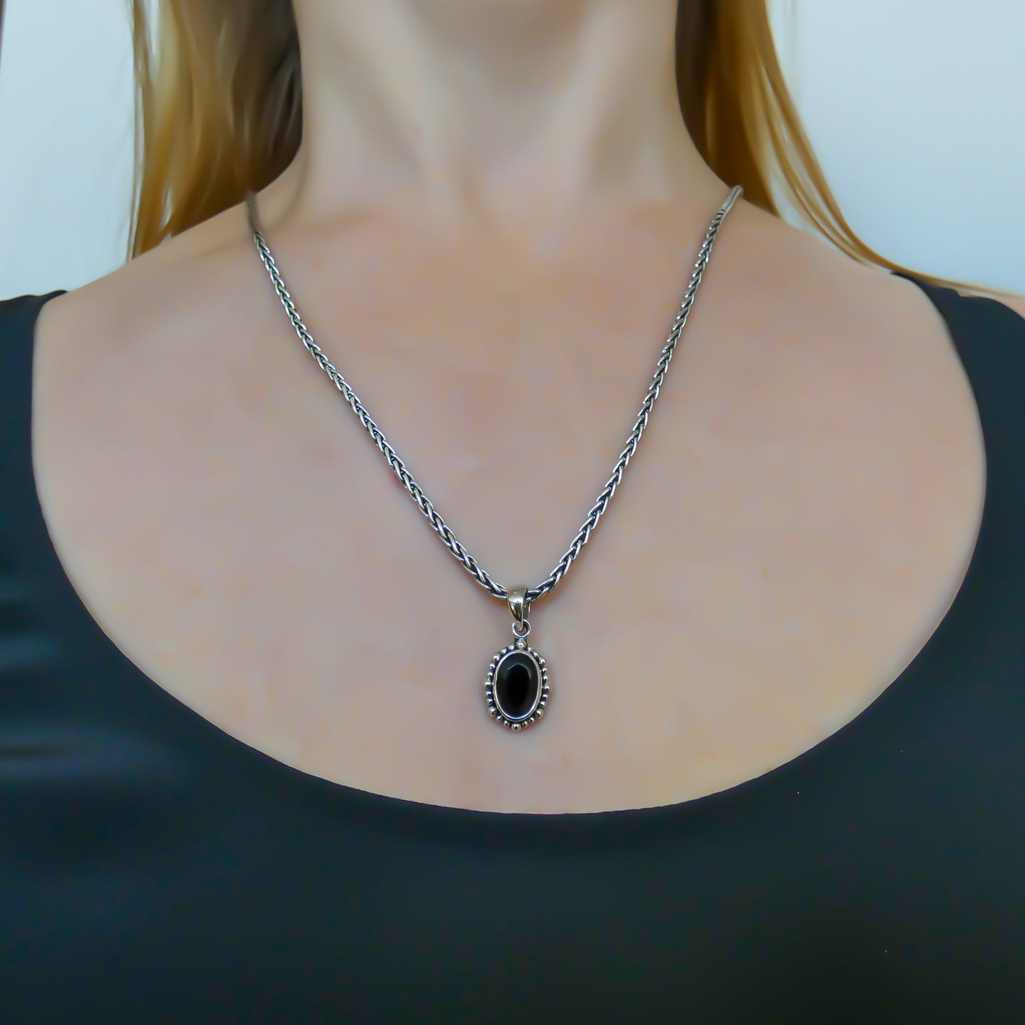 P004BOF PADMA .925 Sterling Silver Bali Oval Faceted Black Onyx Beaded Pendant.