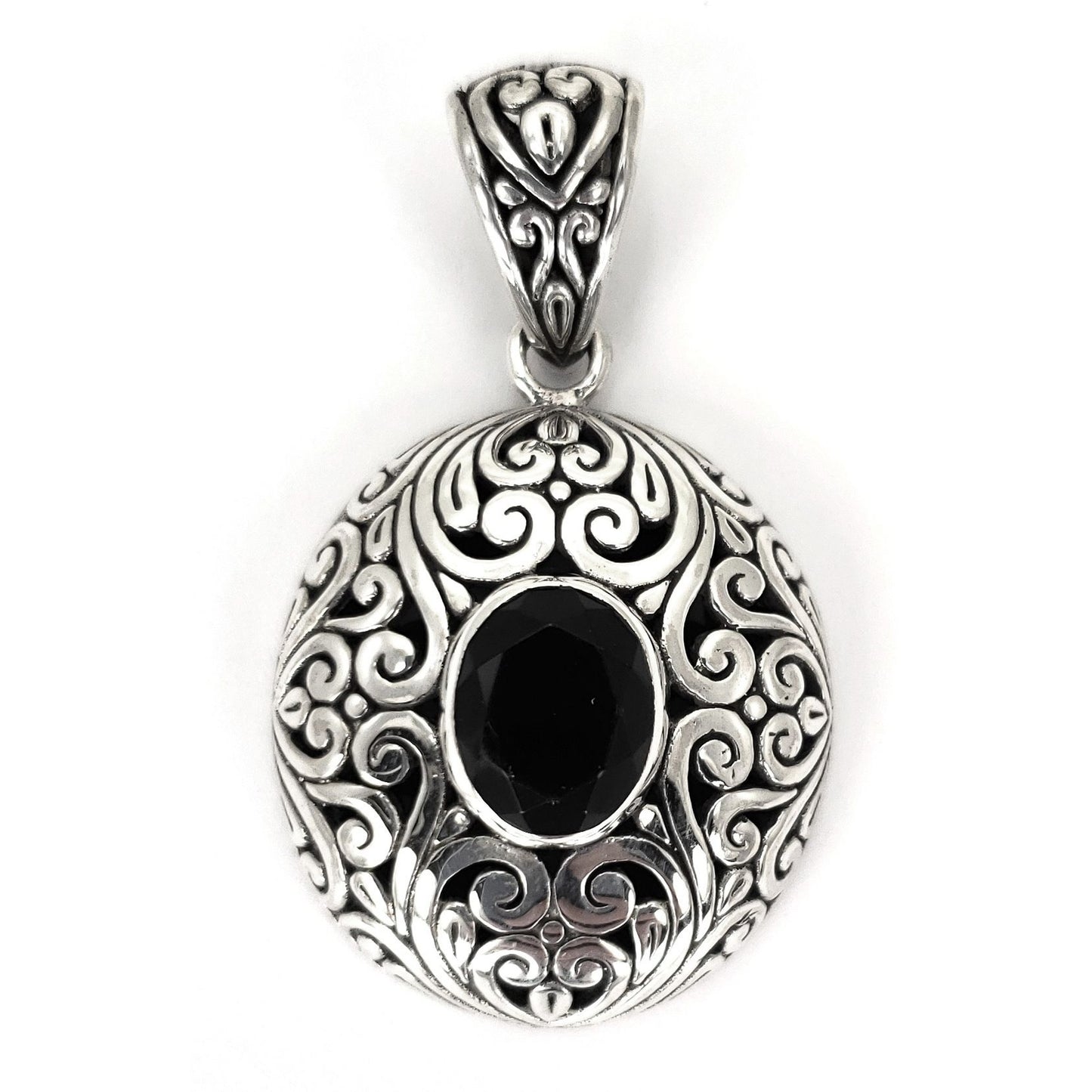 Sterling silver and faceted onyx pendant.
