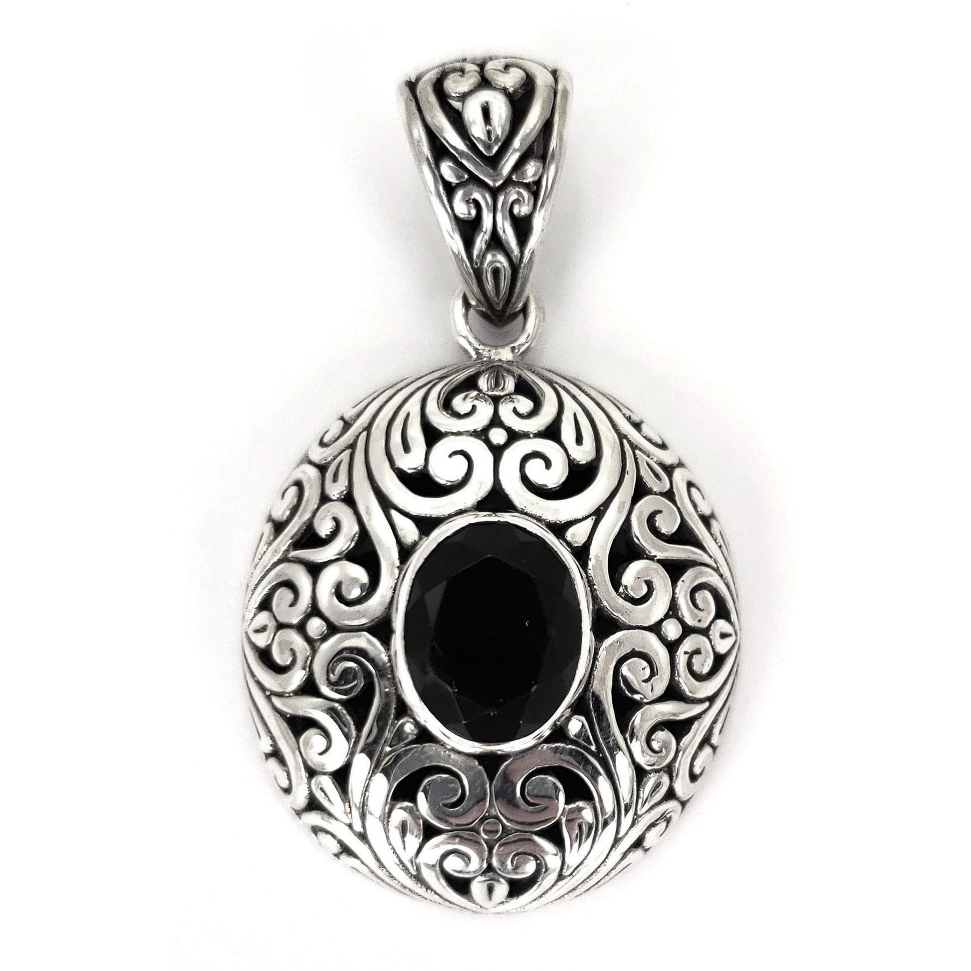 Sterling silver and faceted onyx pendant.