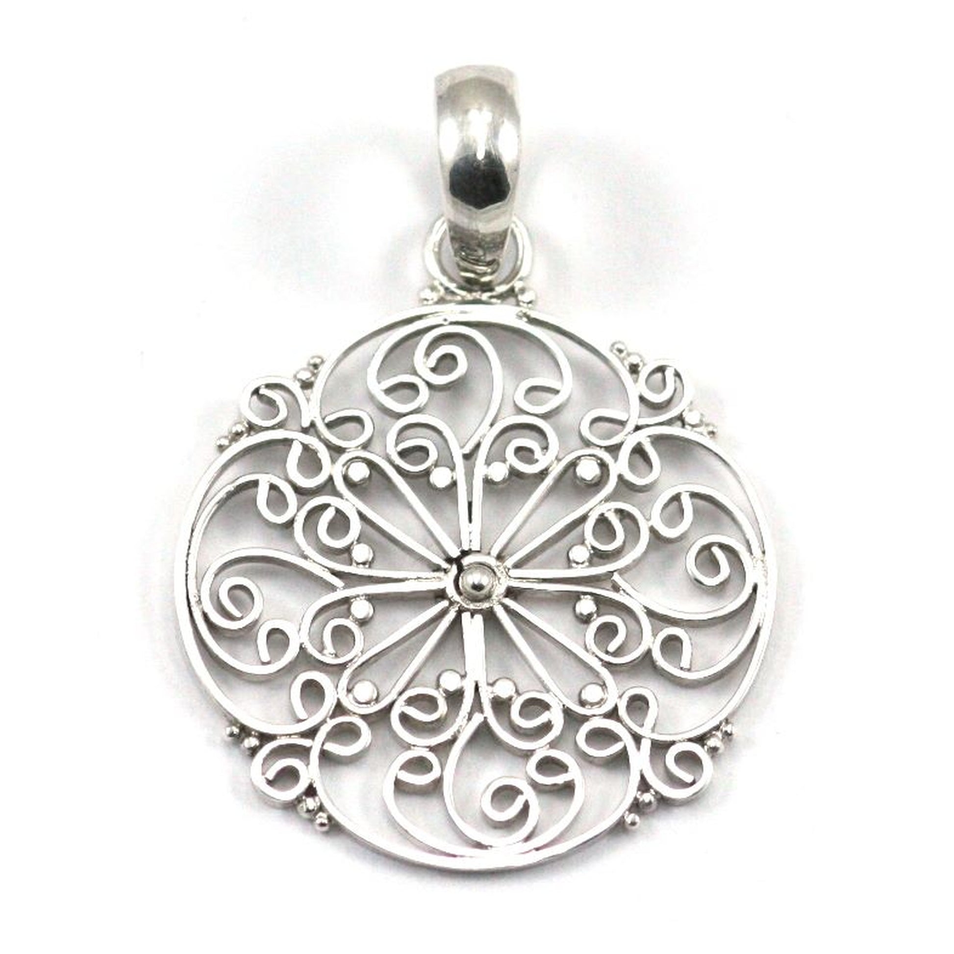 Sterling silver filigree wire pendant.