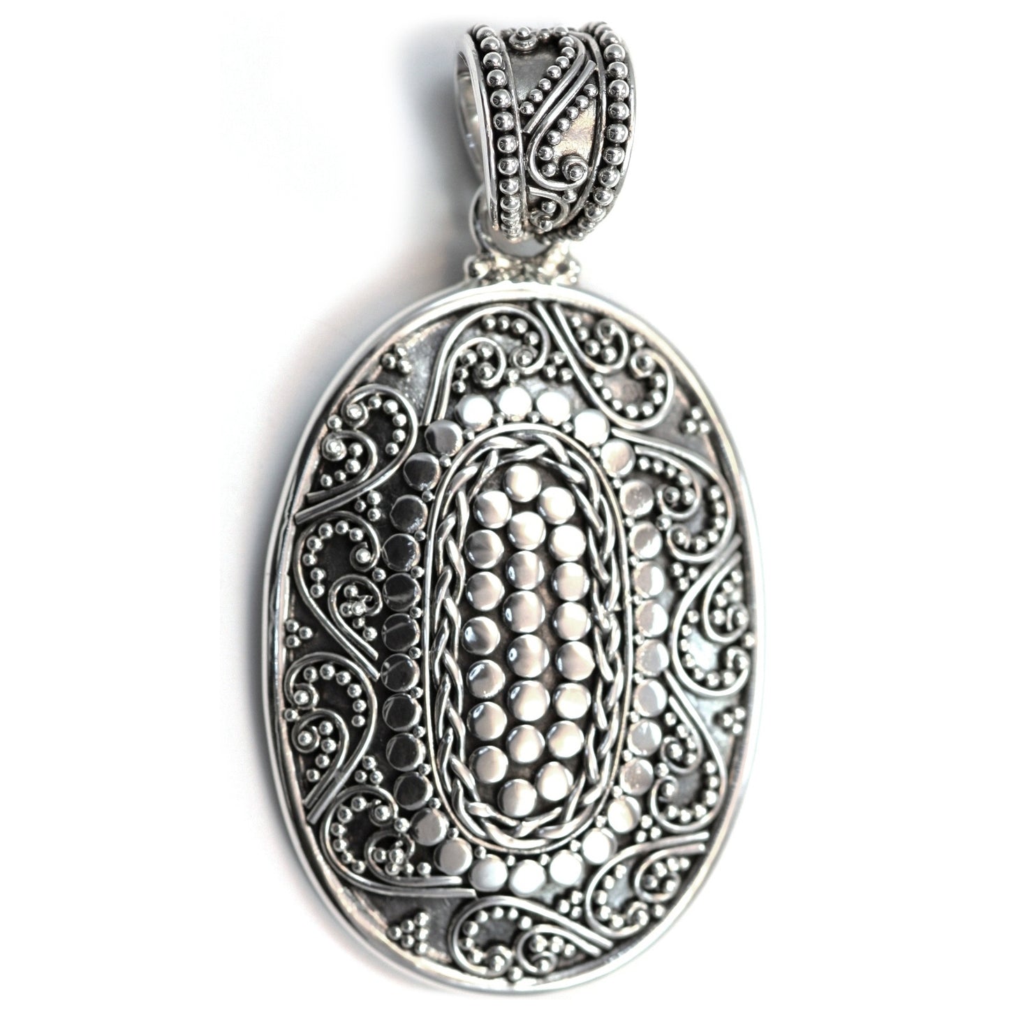 Sterling silver ornate oval large pendant.