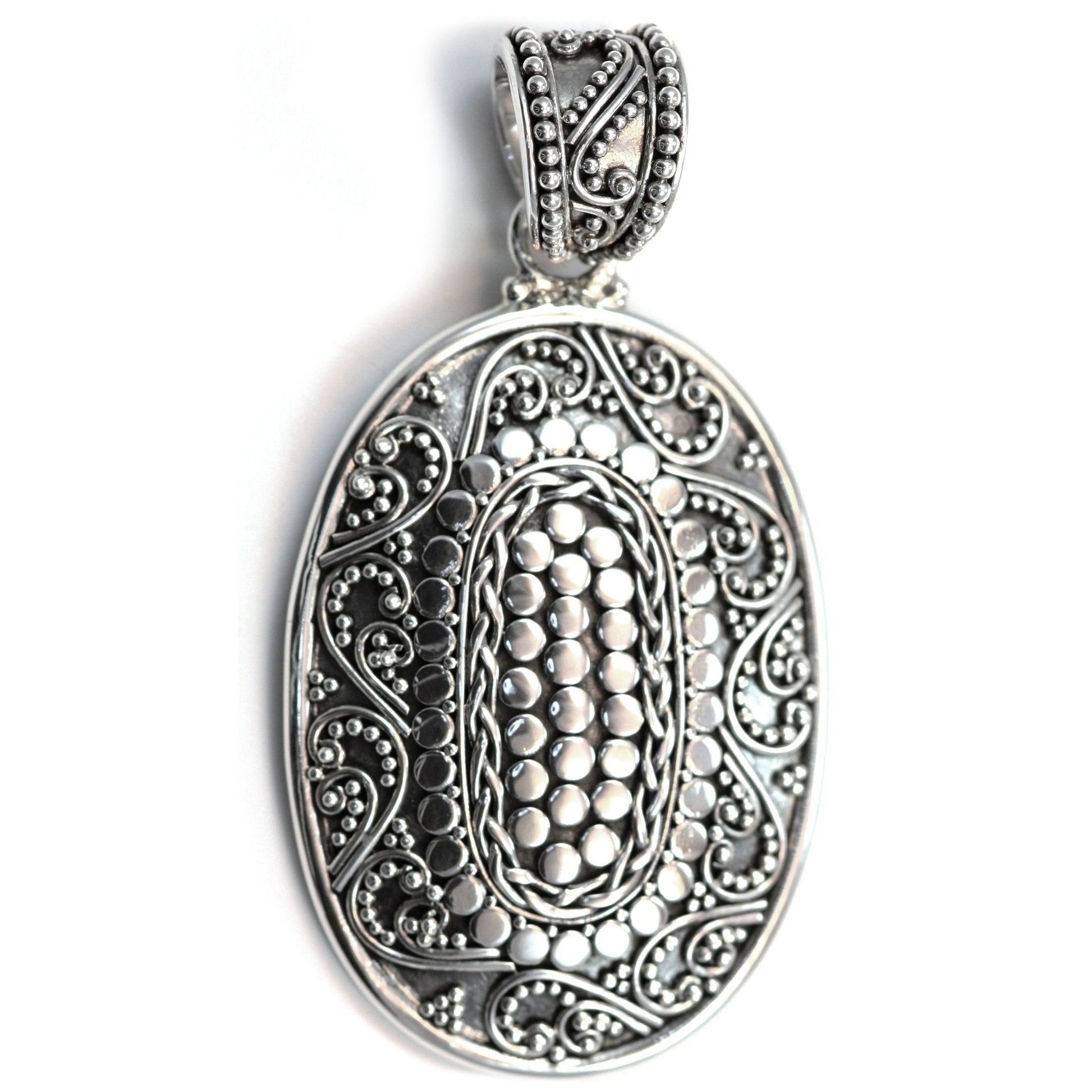 Sterling silver ornate oval large pendant.