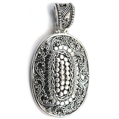 Sterling silver ornate oval large pendant.