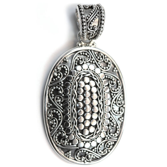 Sterling silver ornate oval large pendant.