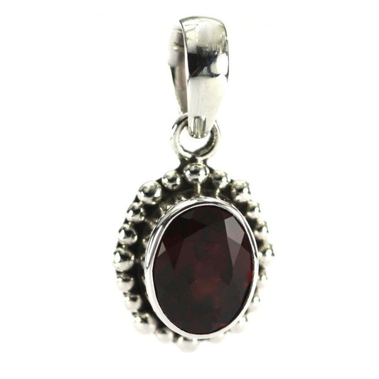 Sterling silver and oval garnet pendant.