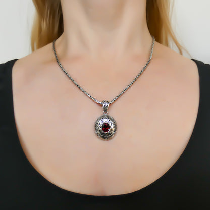 P711FG MODA .925 Sterling Silver Carved Bali Pendant with Garnet
