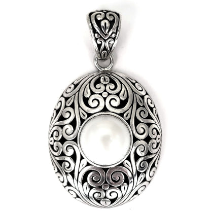 Sterling silver and pearl pendant.