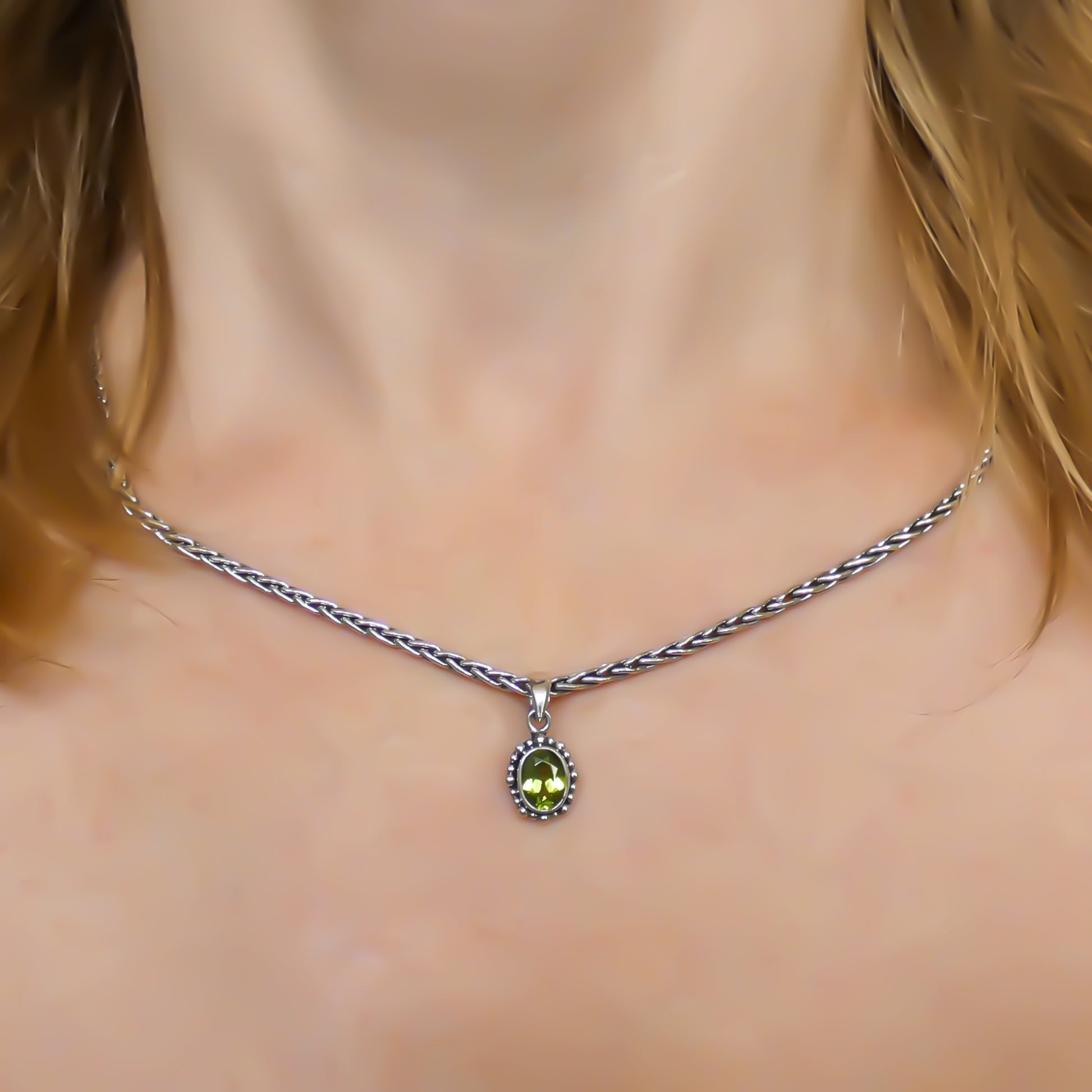 Sterling silver and peridot pendant.