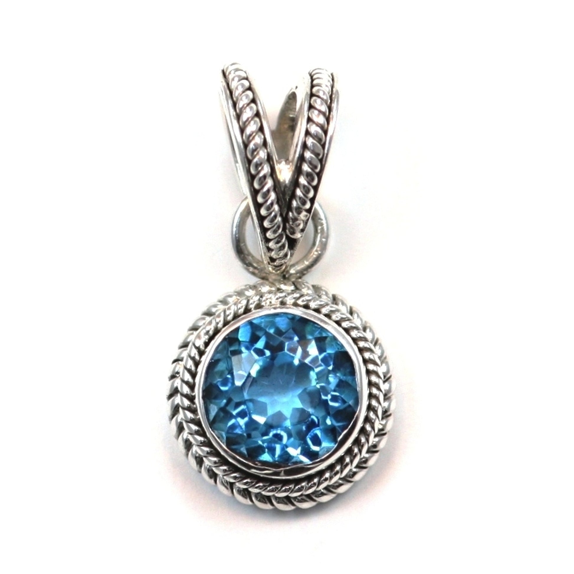 Silver pendant with round blue topaz gemstone.
