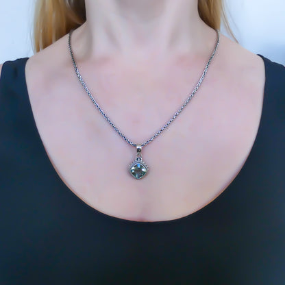Sterling silver and green amethyst pendant.
