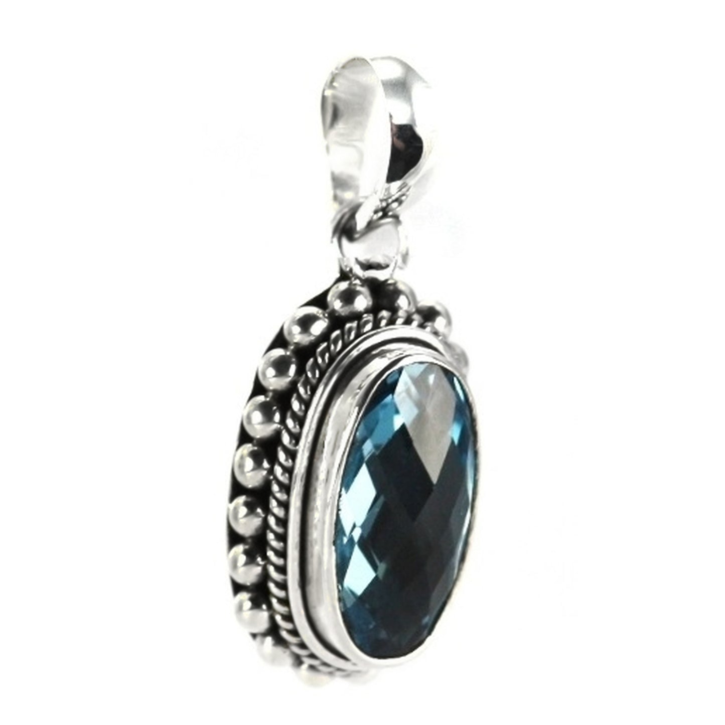 Silver pendant with oval blue topaz gemstone.
