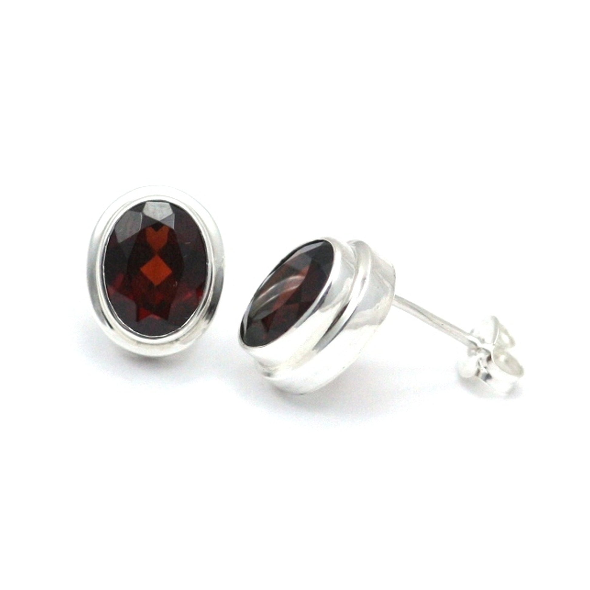 High polish plain setting sterling silver oval post earrings with garnet.