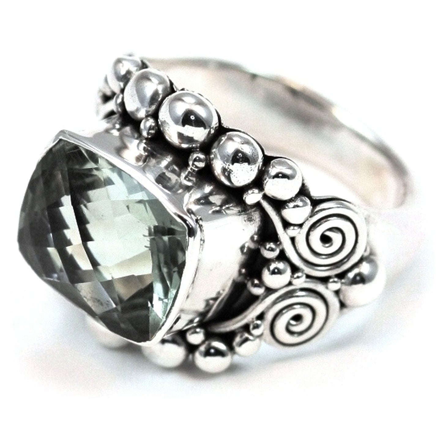 Silver ring with green amethyst gemstone.