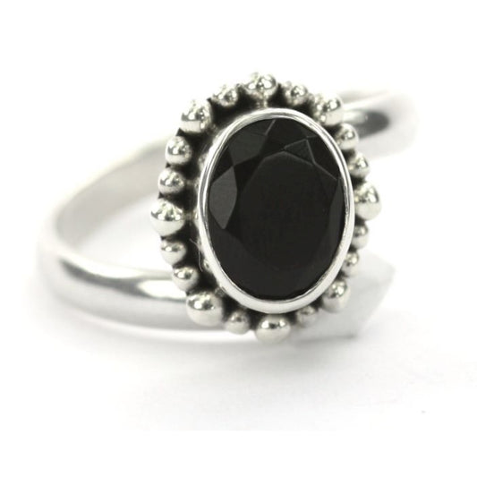 Sterling silver and faceted onyx ring.