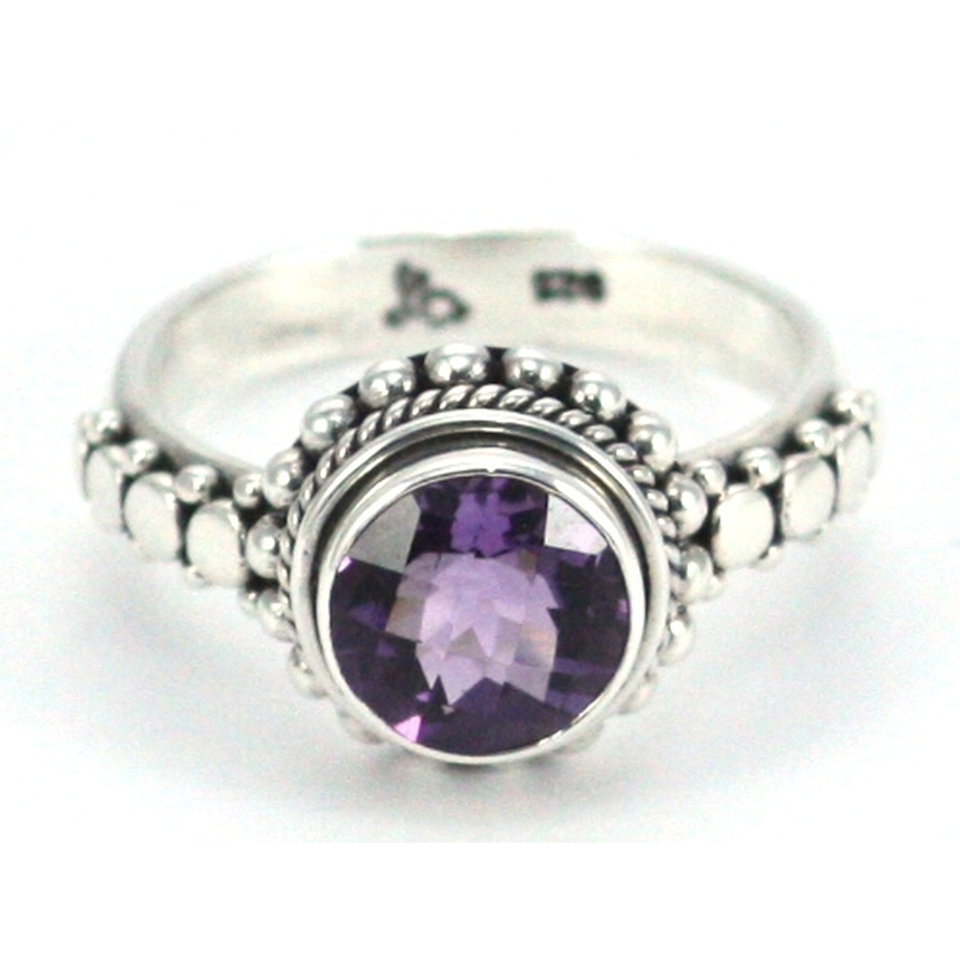 Sterling silver and round amethyst ring.