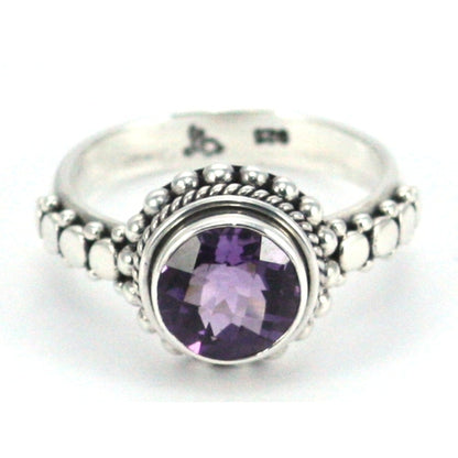 Sterling silver and round amethyst ring.
