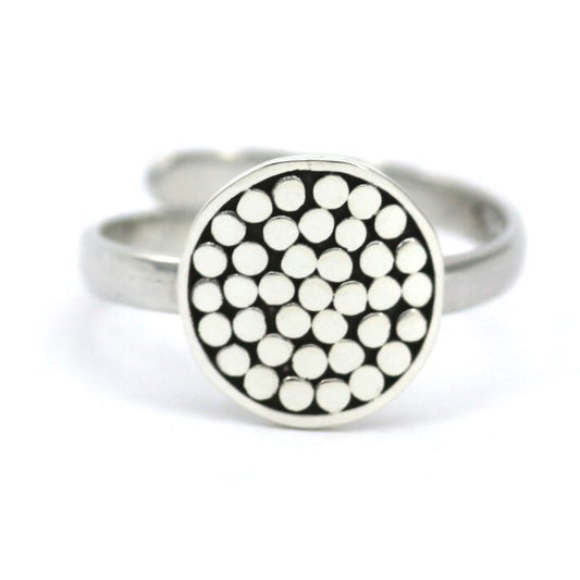 Sterling silver ring with center disc.