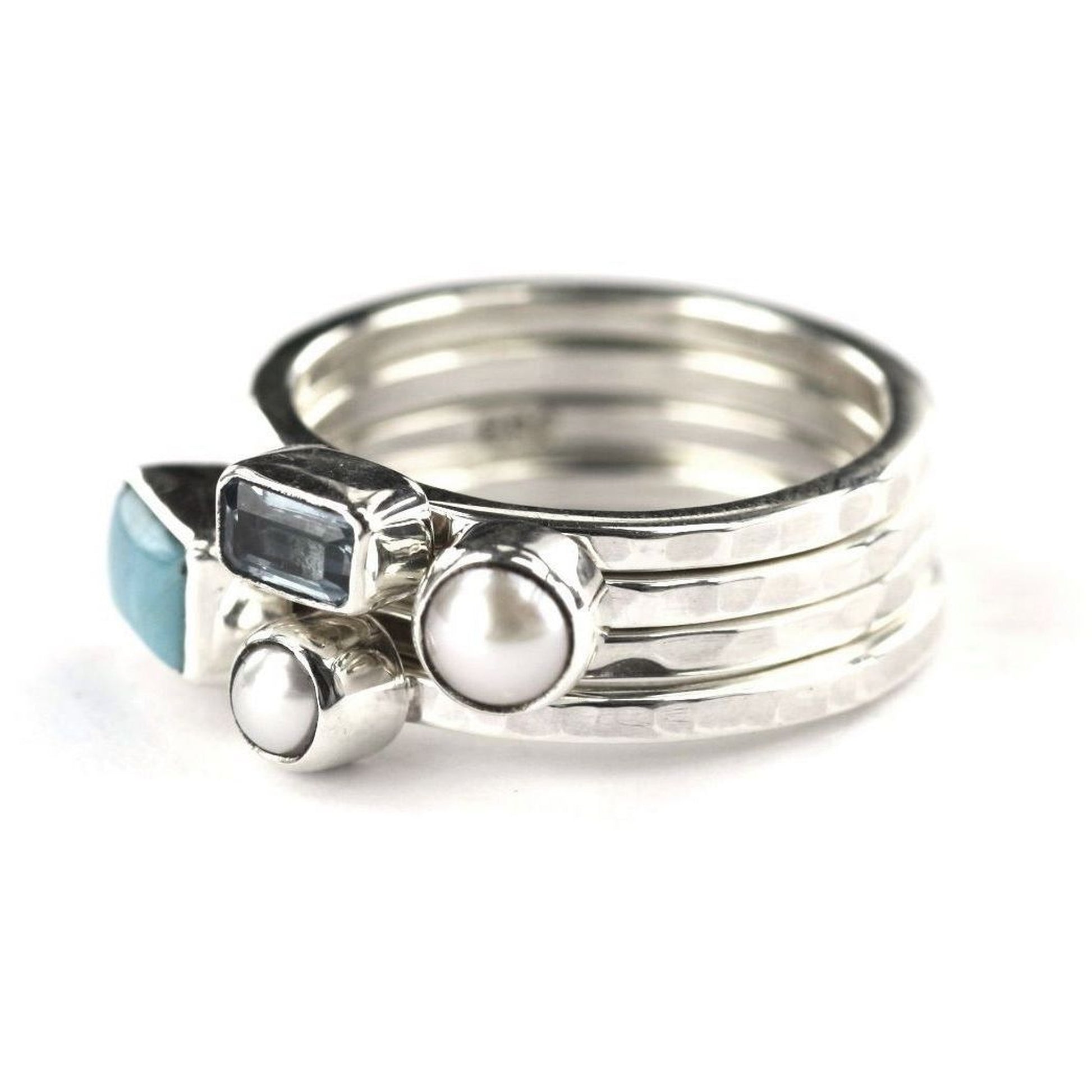 Sterling silver ring set with pearl and turquoise.