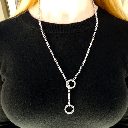 Lariat style sterling silver necklace.