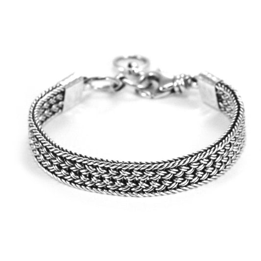 Braided silver flat bracelet with hammered end caps and lobster clasp.