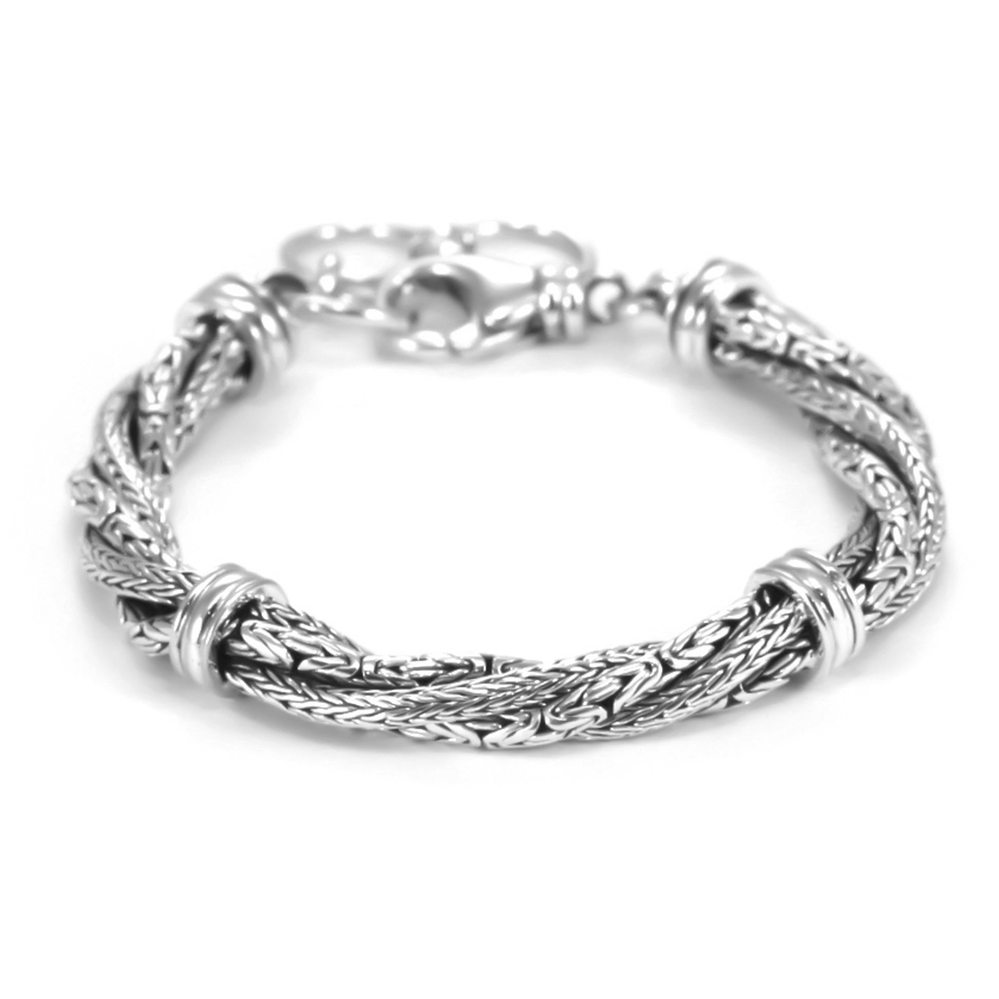 Silver bracelet made of twisted byzantine and herringbone chains.