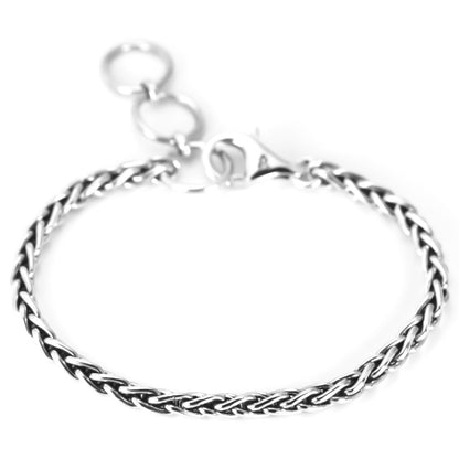 Wide silver wheat chain bracelet with lobster clasp and three jump rings.