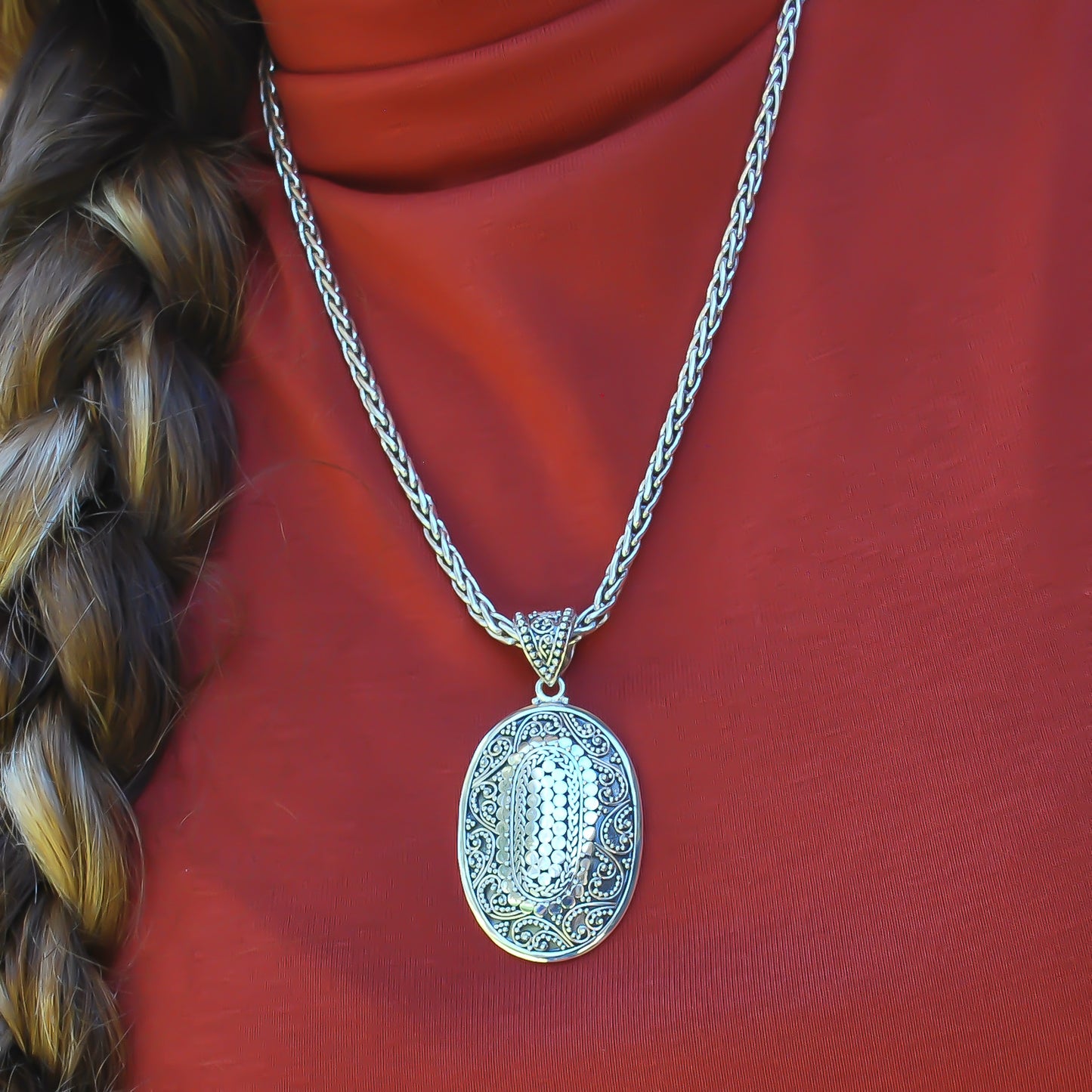 Sterling silver ornate oval large pendant.