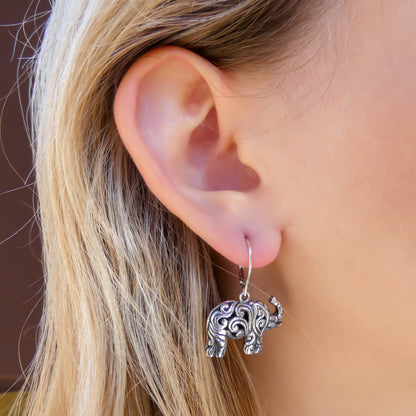 Sterling silver elephant earrings.