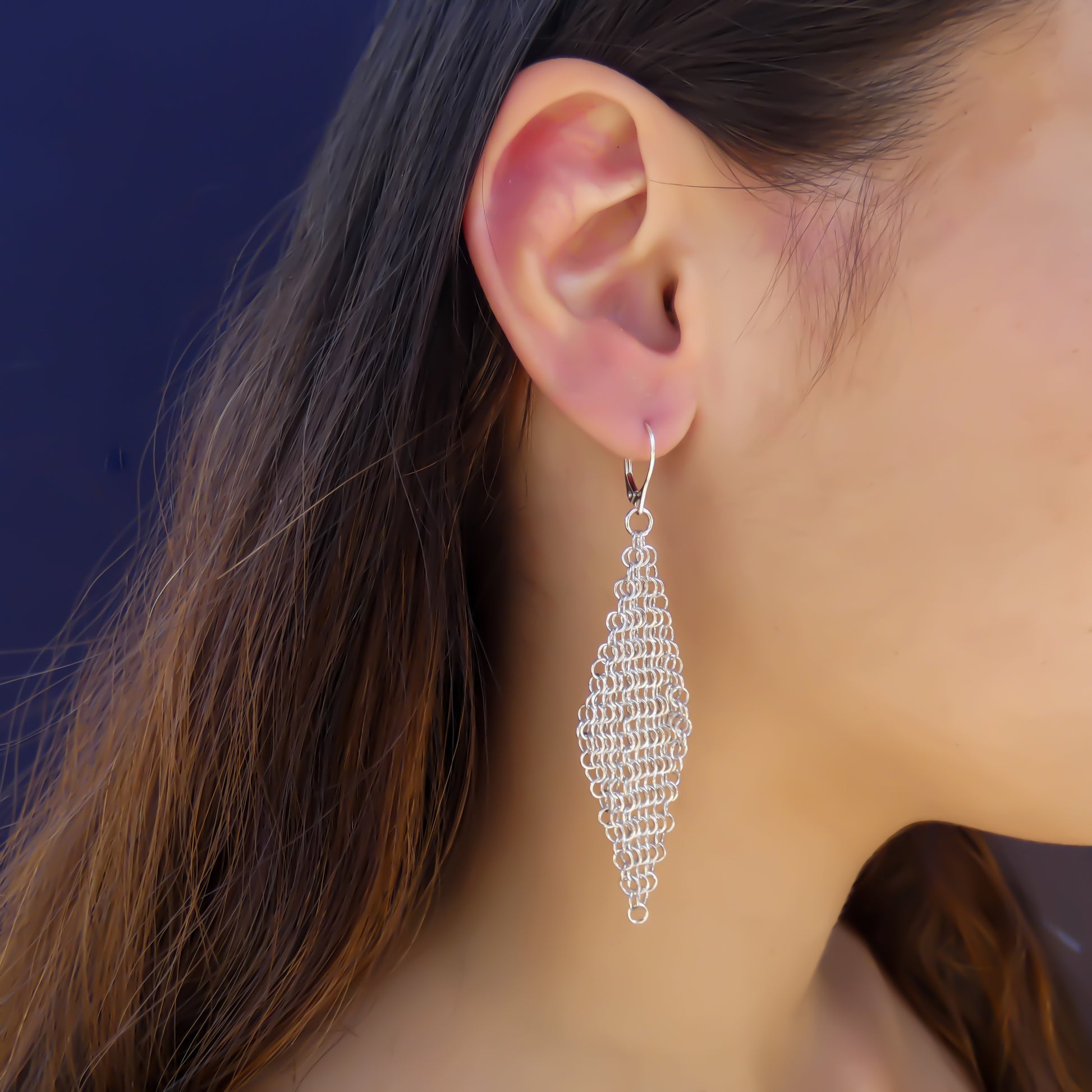 Sterling silver mesh dangle earrings.