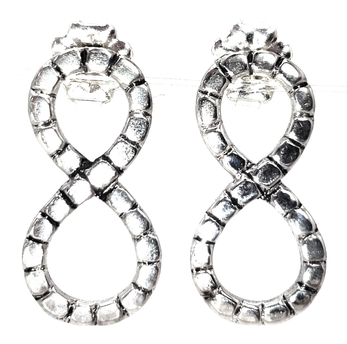 Sterling silver infinity earrings.