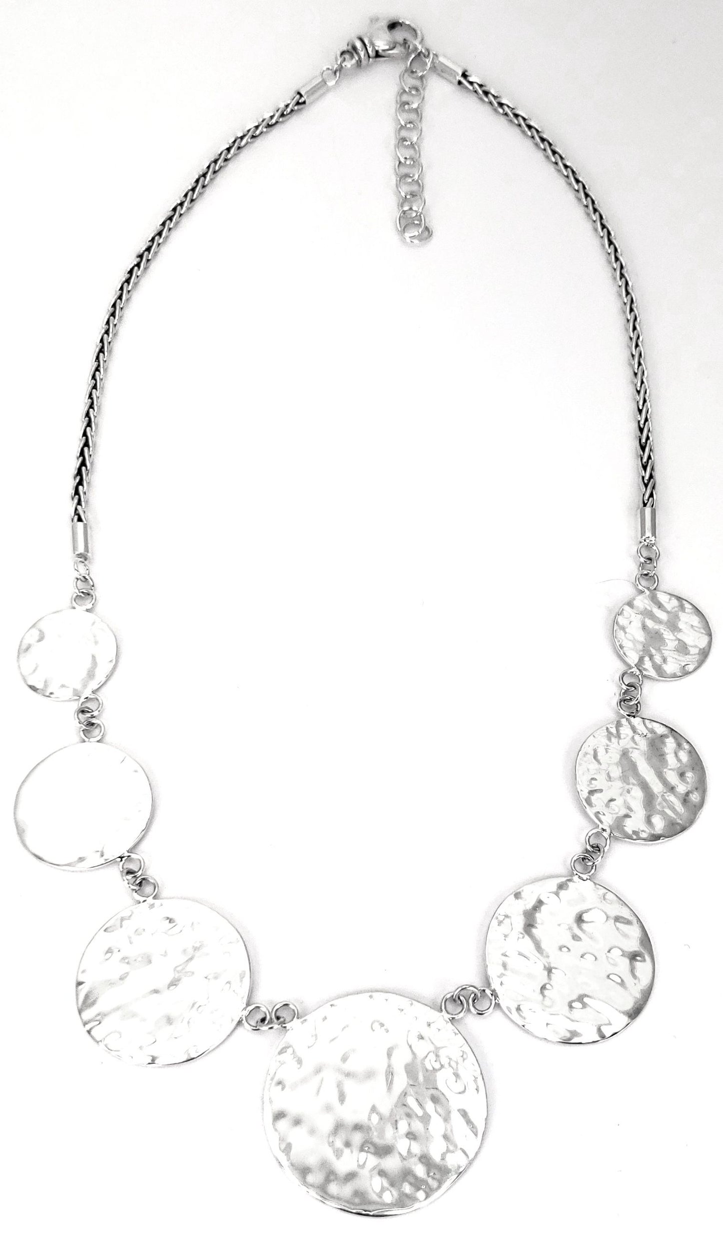 Sterling silver hammered disc necklace.